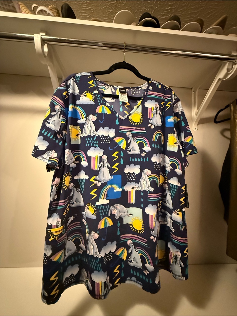 Disney Navy Scrub Top with Eeyore & Rainbow Weather Motif